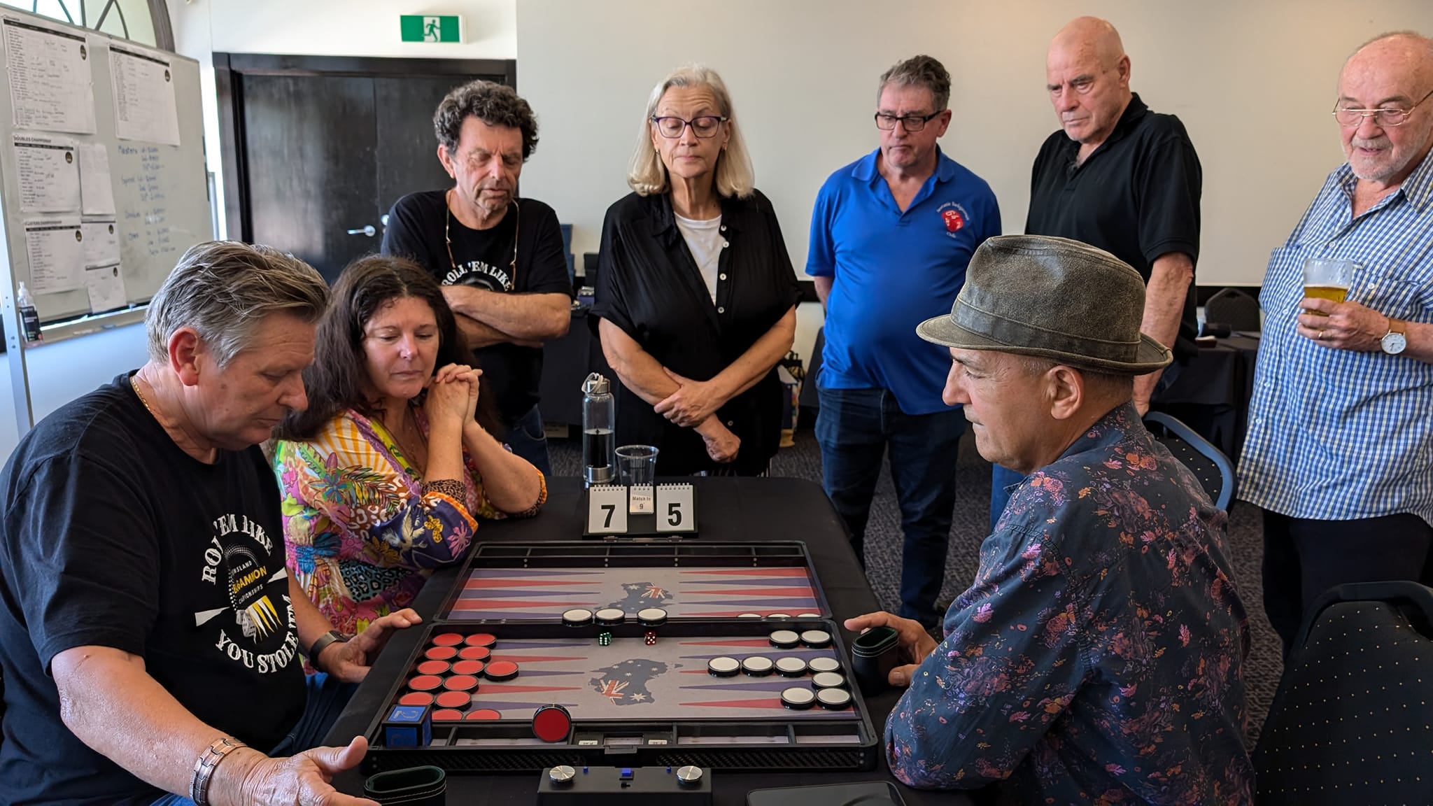 People watch in 4 backgammon players